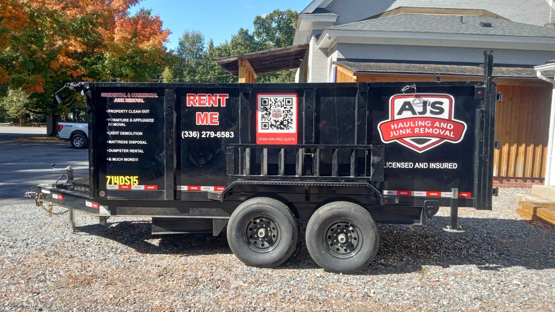 AJs Hauling and Junk Removal Black Trailer