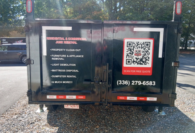 black trailer with qr code on the body